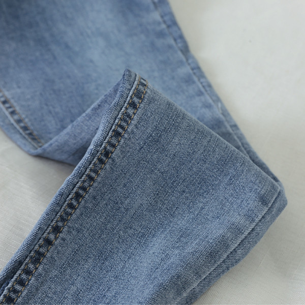 Sieviešu ikdienas garie džinsi ar taisnām modeļa kabatām un augstu vidukli