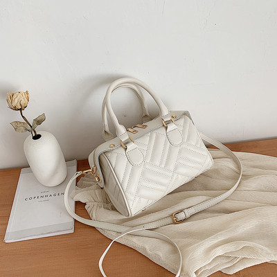 Sieviešu ādas soma ar rāvējslēdzēju un garu rokturi