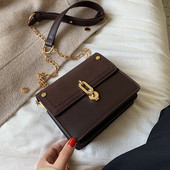 Modern női táska eko bőrből, hosszú fém fogantyúval