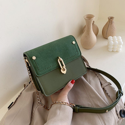 Modern női táska eko bőrből, hosszú fém fogantyúval