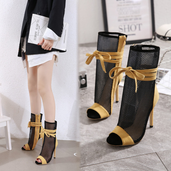 Modern női magas sarkú cipő fűzővel és cipzárral