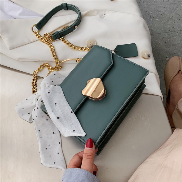 Moderna sieviešu soma ar punktu lentu un diviem rokturiem