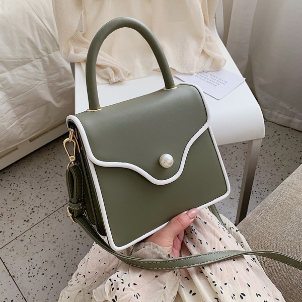 Modern női bőr táska gyöngy díszítéssel és két fogantyúval