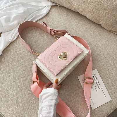 Stilinga moteriška rankinė iš dirbtinės odos su tekstiline rankena