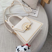 Moderna sieviešu soma ar metāla aizdari un garu un īsu ādas rokturi