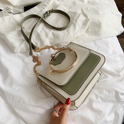 Eko bőrből készült modern női táska fém fogantyúval