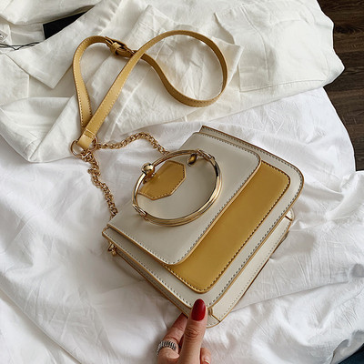 Eko bőrből készült modern női táska fém fogantyúval