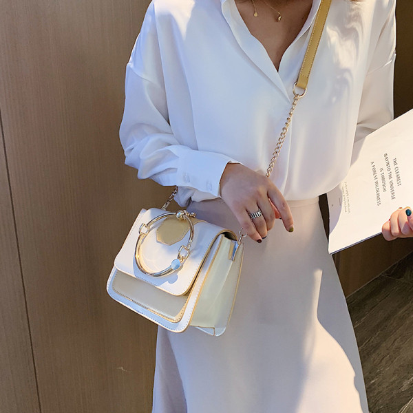 Eko bőrből készült modern női táska fém fogantyúval