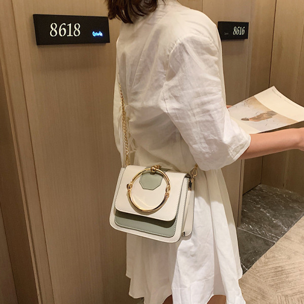 Eko bőrből készült modern női táska fém fogantyúval