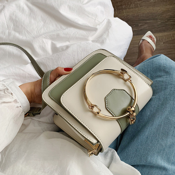 Eko bőrből készült modern női táska fém fogantyúval