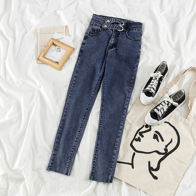 Női lezser hosszú farmernadrág zsebekkel és gombokkal