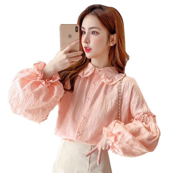 Modern női ing széles ujjakkal és gombokkal