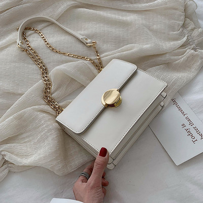 Stilīga sieviešu soma ar metāla elementu un ķēdīti