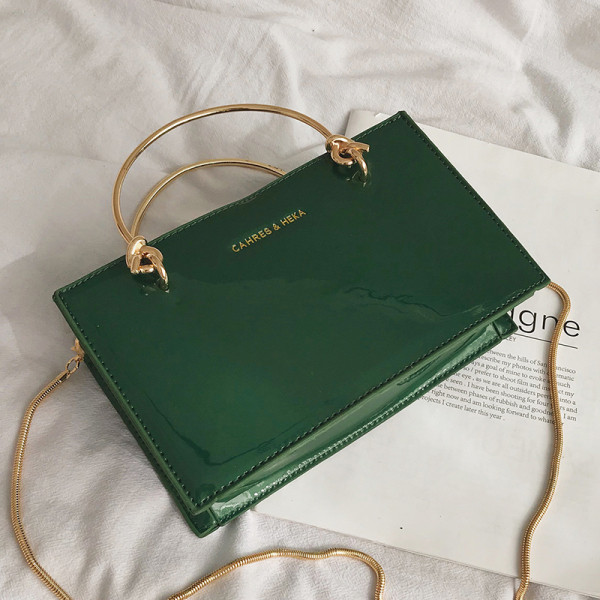 Stilīga sieviešu soma ar metāla īsu un garu rokturi