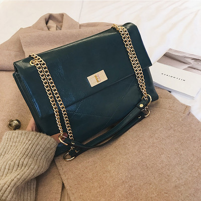 Laisvalaikio moteriška rankinė su ilga metaline rankena