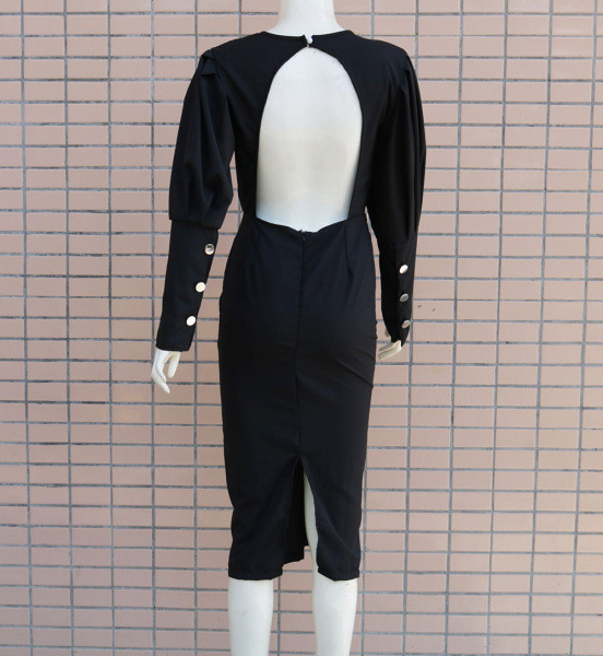 Модерна дамска рокля с дълъг ръкав,цепка и гол гръб 