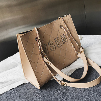 Moderna sieviešu ādas soma ar uzrakstu