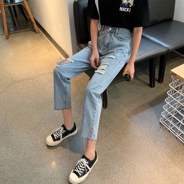 Blugi de dama moderni model drept cu talie inalta si motive rupte