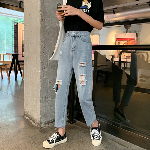 Blugi de dama moderni model drept cu talie inalta si motive rupte