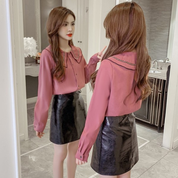 Stilīgs sieviešu krekls ar apaļu kakla izgriezumu un garām piedurknēm