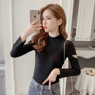 Laisva moteriška palaidinė pusiau aukšta apykakle ir ilgomis rankovėmis