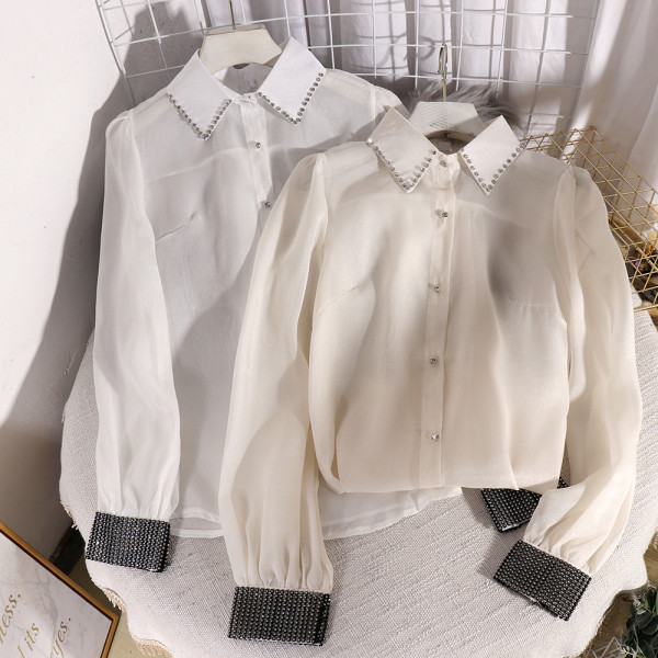 Moderna ženska košulja s klasičnom kragnom, dugim rukavima i kamenčićima