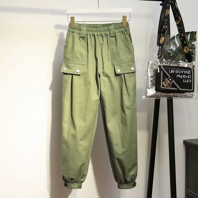 Alkalmi női hosszú nadrág zsebekkel és nyakkendőkkel