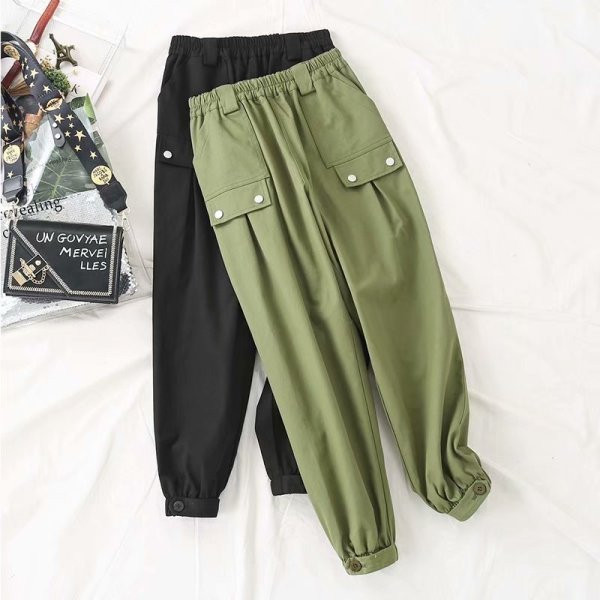 Alkalmi női hosszú nadrág zsebekkel és nyakkendőkkel