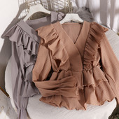 Stilinga moteriška iškirpta palaidinė ilgomis rankovėmis ir V formos iškirpte