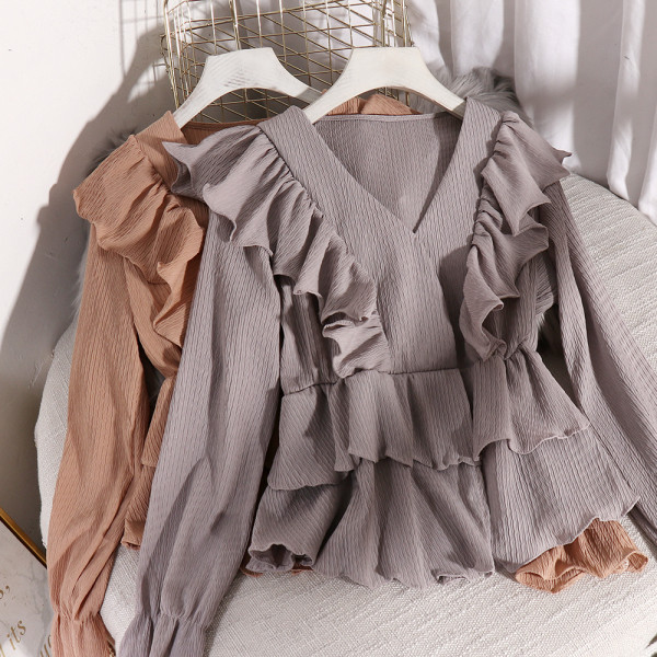 Stilinga moteriška iškirpta palaidinė ilgomis rankovėmis ir V formos iškirpte