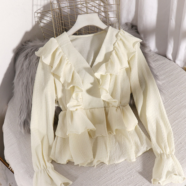 Stilinga moteriška iškirpta palaidinė ilgomis rankovėmis ir V formos iškirpte