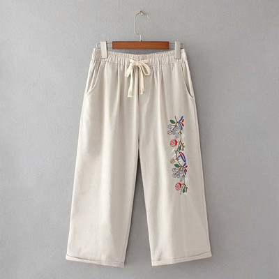 Alkalmi női nadrág magas derékkal és hímzéssel