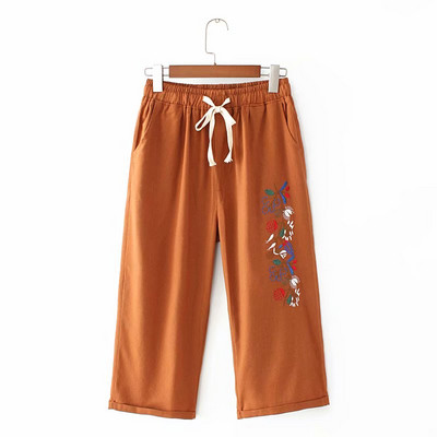 Alkalmi női nadrág magas derékkal és hímzéssel