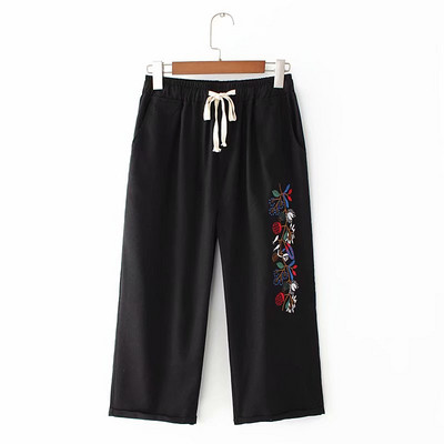 Alkalmi női nadrág magas derékkal és hímzéssel