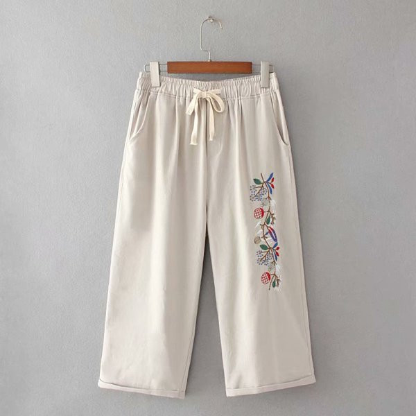 Alkalmi női nadrág magas derékkal és hímzéssel