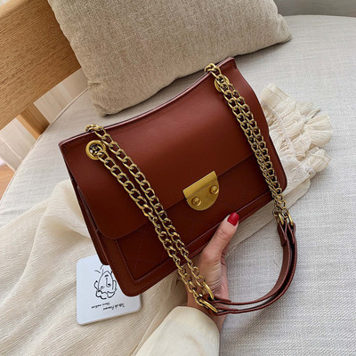 Geanta de dama eleganta din piele ecologica cu inchidere metalica