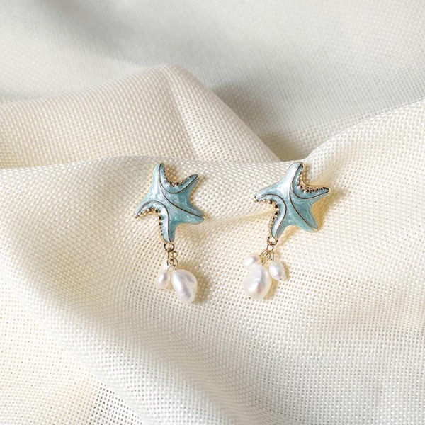 Sieviešu auskari jūras zvaigznes formā ar pērlēm