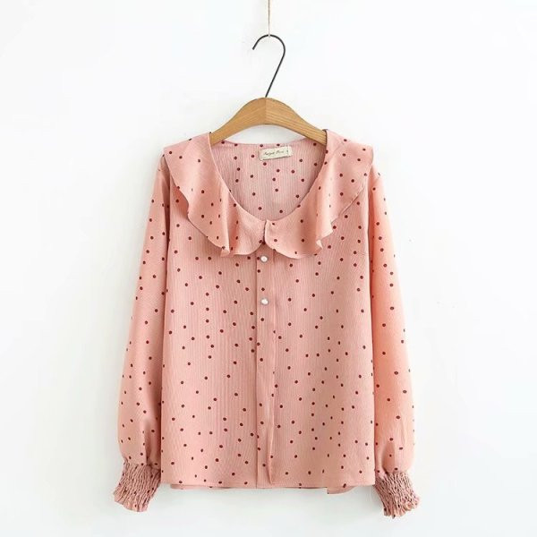 Moodne naiste särk ovaalse kaelusega ja pikkade kummikutega varrukatega