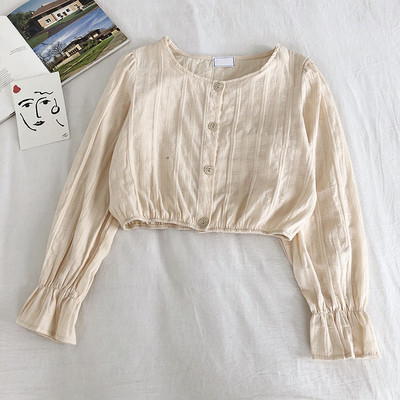 Modern női ing ovális nyakkivágással és széles ujjakkal