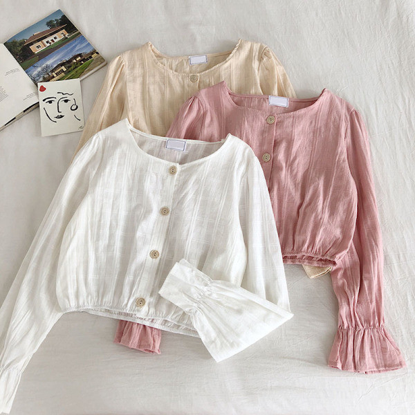 Modern női ing ovális nyakkivágással és széles ujjakkal