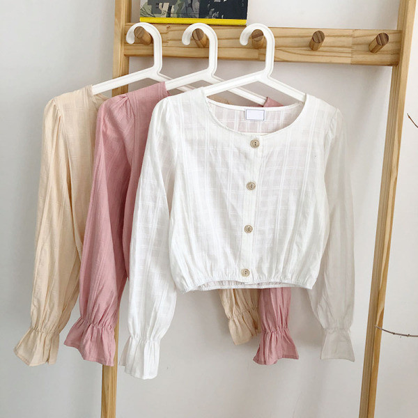 Modern női ing ovális nyakkivágással és széles ujjakkal