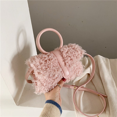 Moderna sieviešu dūnu soma ar garu ādas rokturi