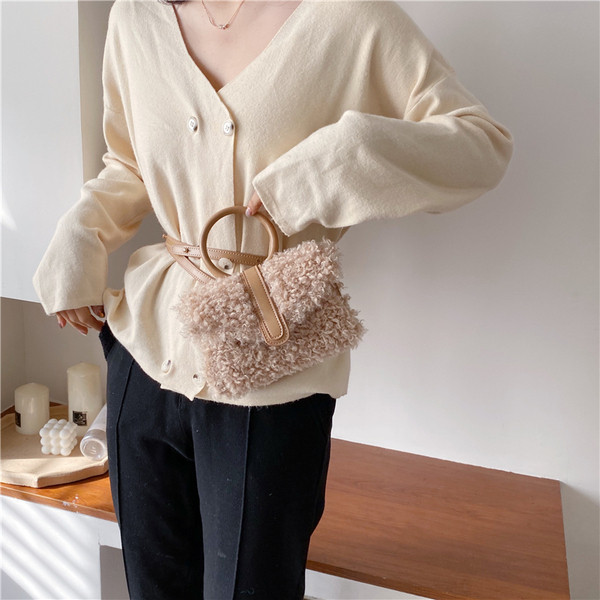 Moderna sieviešu dūnu soma ar garu ādas rokturi