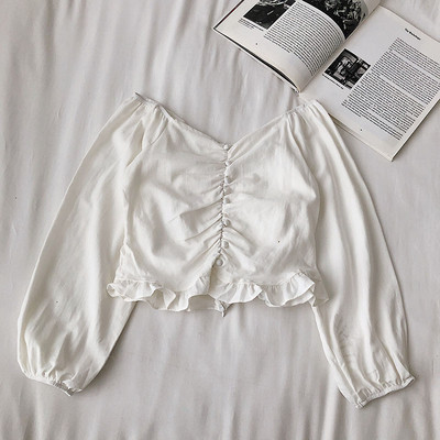 Pašreizējā sieviešu īsā blūze ar platām piedurknēm