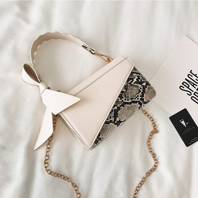 Stilīga rokassomiņa ar ādas lenti un čūskas rakstu