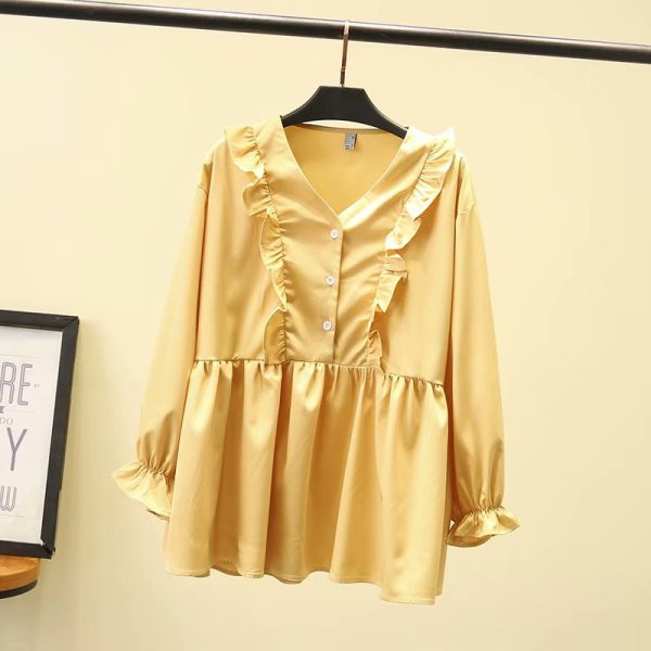 Modern női blúz hosszú ujjal és mély nyakkivágással