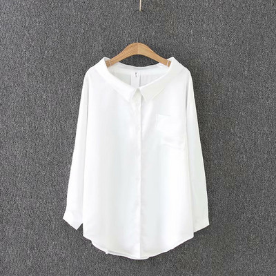 Modern női ing sima modell ovális nyakkivágással és zsebbel