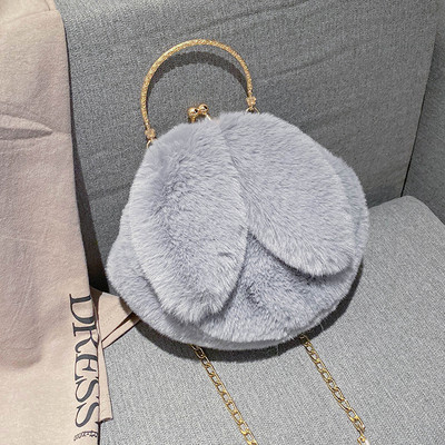 Női pehelytáska 3D elemmel és fém fogantyúval