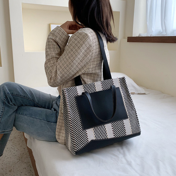 Ikdienas rokassomiņa ar īsu rokturi