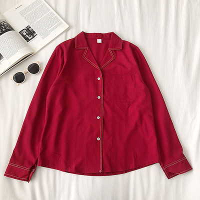 Moderns sieviešu krekls ar kabatu un pogām